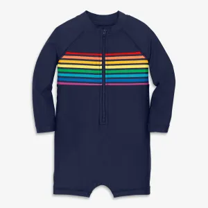 Baby one-piece rash guard in rainbow placed stripe